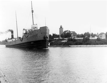 An ore ship leaves Portage Canal